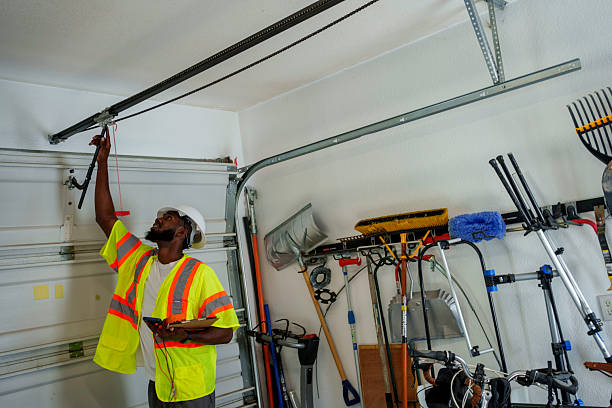 Professional Garage Door Panel Replacement technician working in Crookston, MN